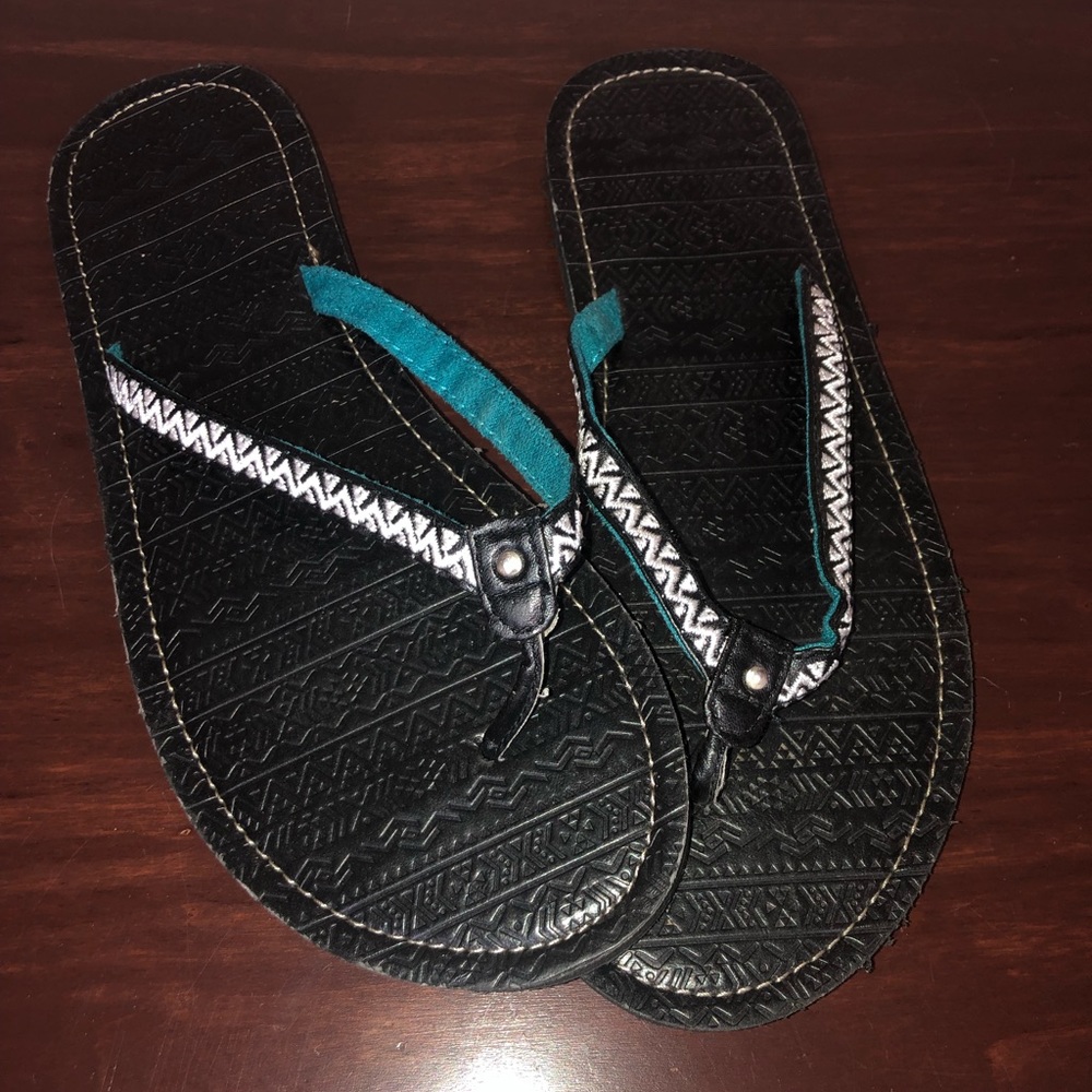 Aztec/tribal flip flops